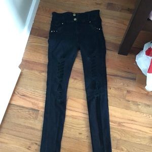 Distressed denim jeans